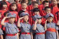 Chinese Communist Children saluting